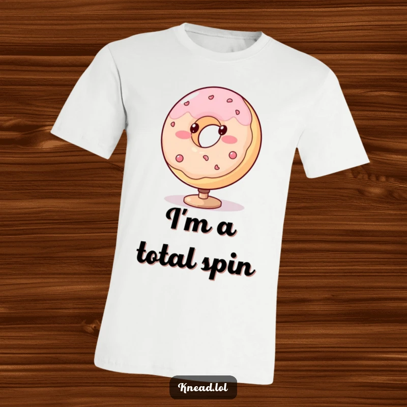 Funny donut t-shirt featuring a blushing, plump character spinning with dotted eyes, a humorous and playful apparel.